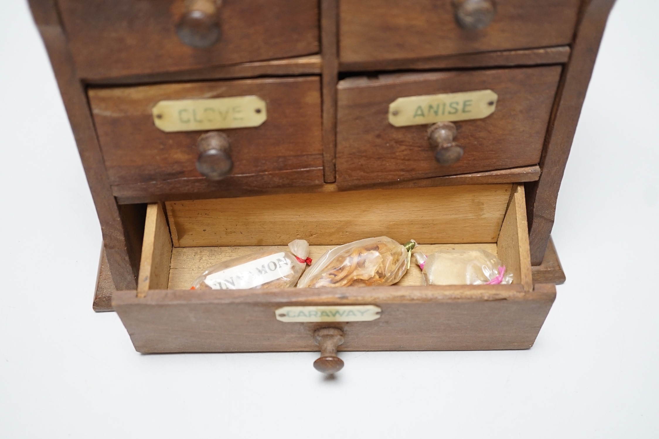 A beech and Bakelite kitchen spice cabinet, 20.5cm wide